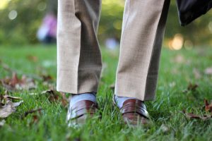 Tan trousers with brown loafers