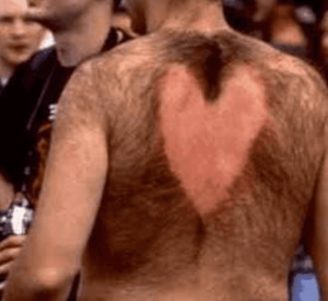Hairy man with heart shaped back wax