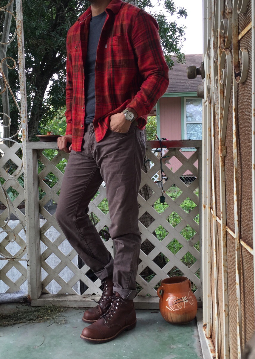 Flannel shirt over a crew neck tee