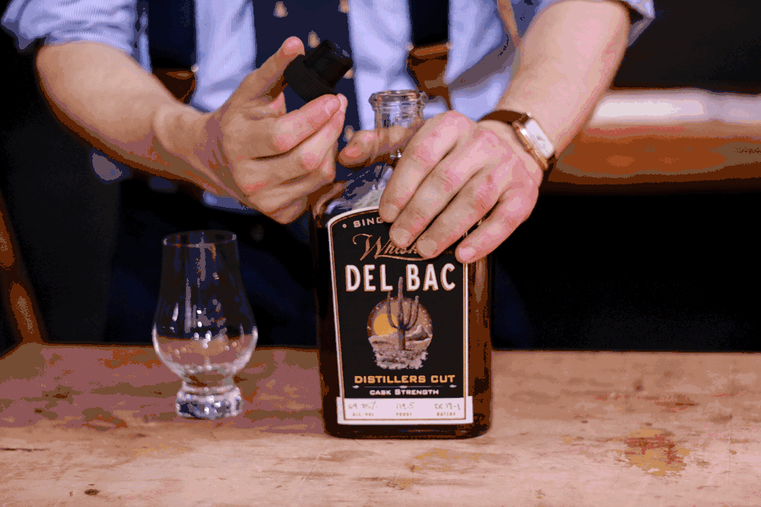 Pouring Whiskey Del Bac