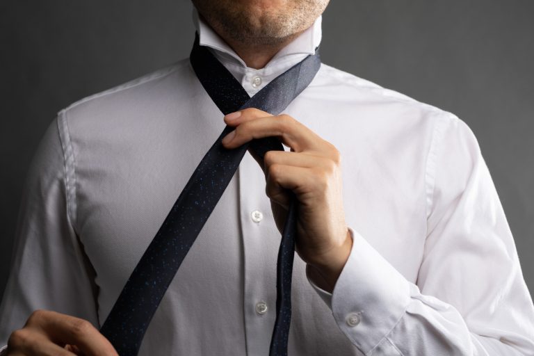 How to Tie a Four In Hand Knot (Step-By-Step Guide) - The Modest Man