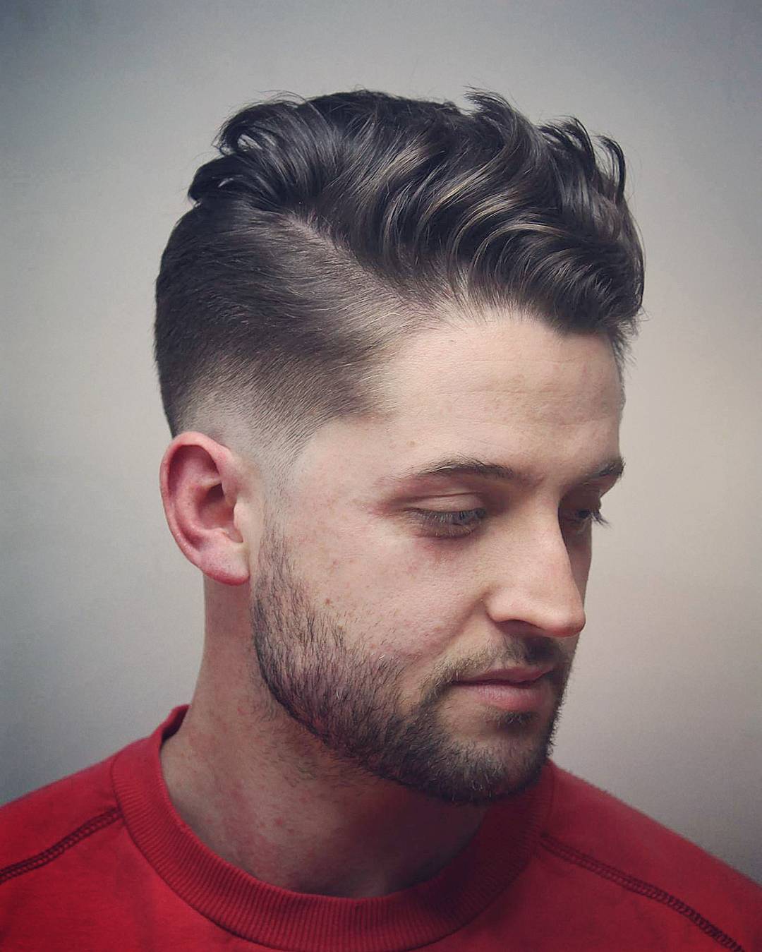 a side part with a fade