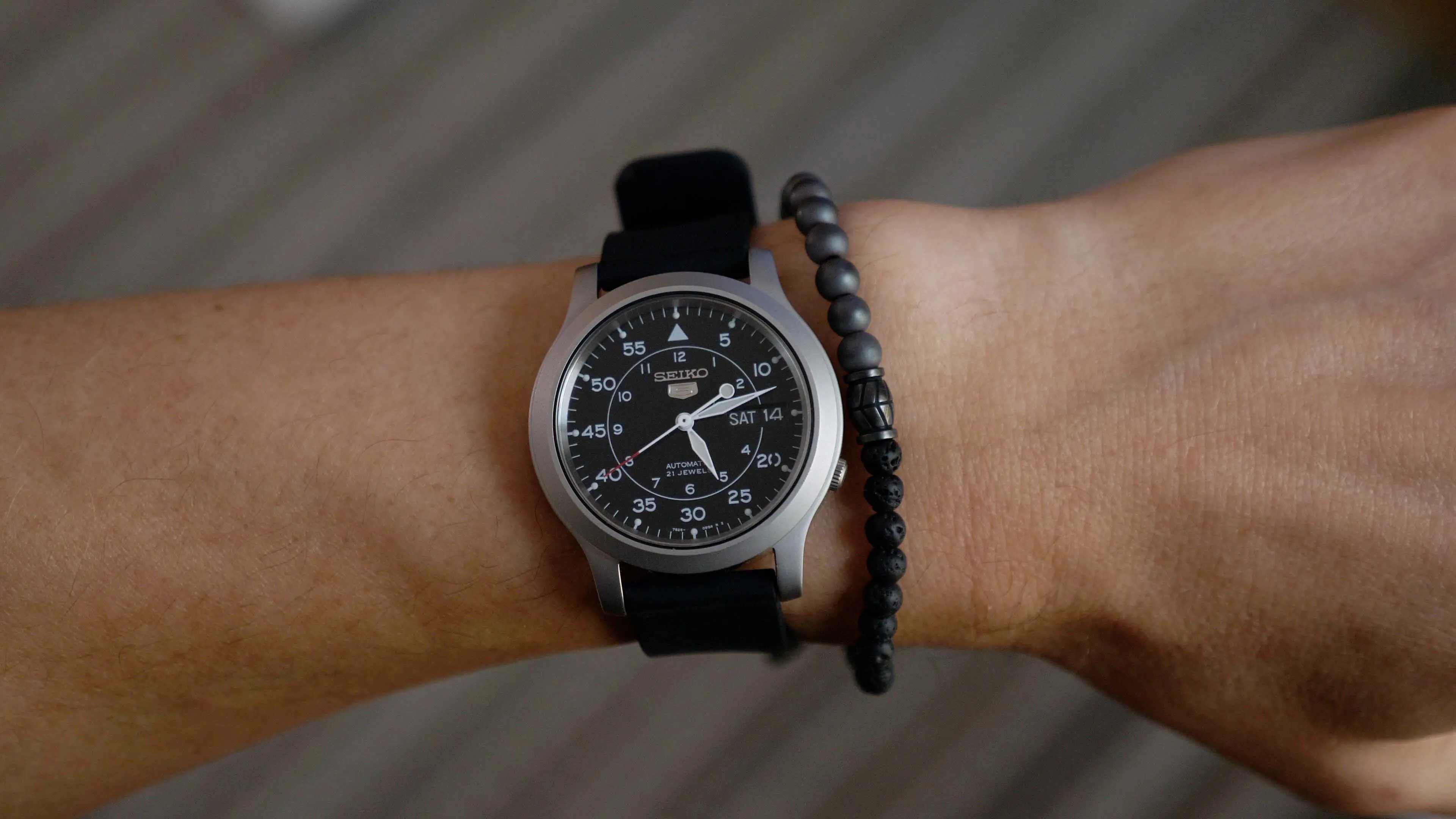 Beaded bracelet with watch