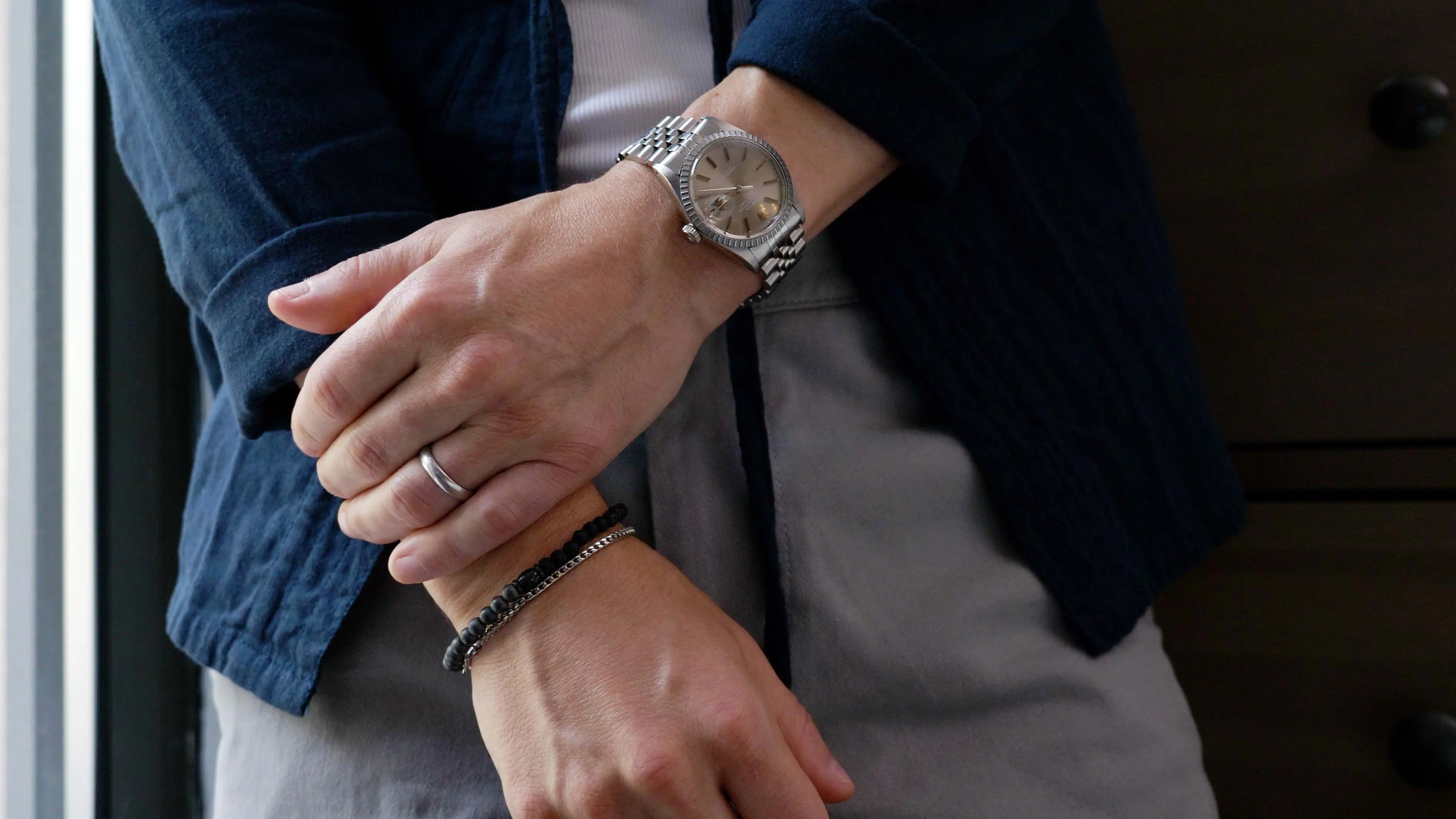 Watch with stacked bracelets