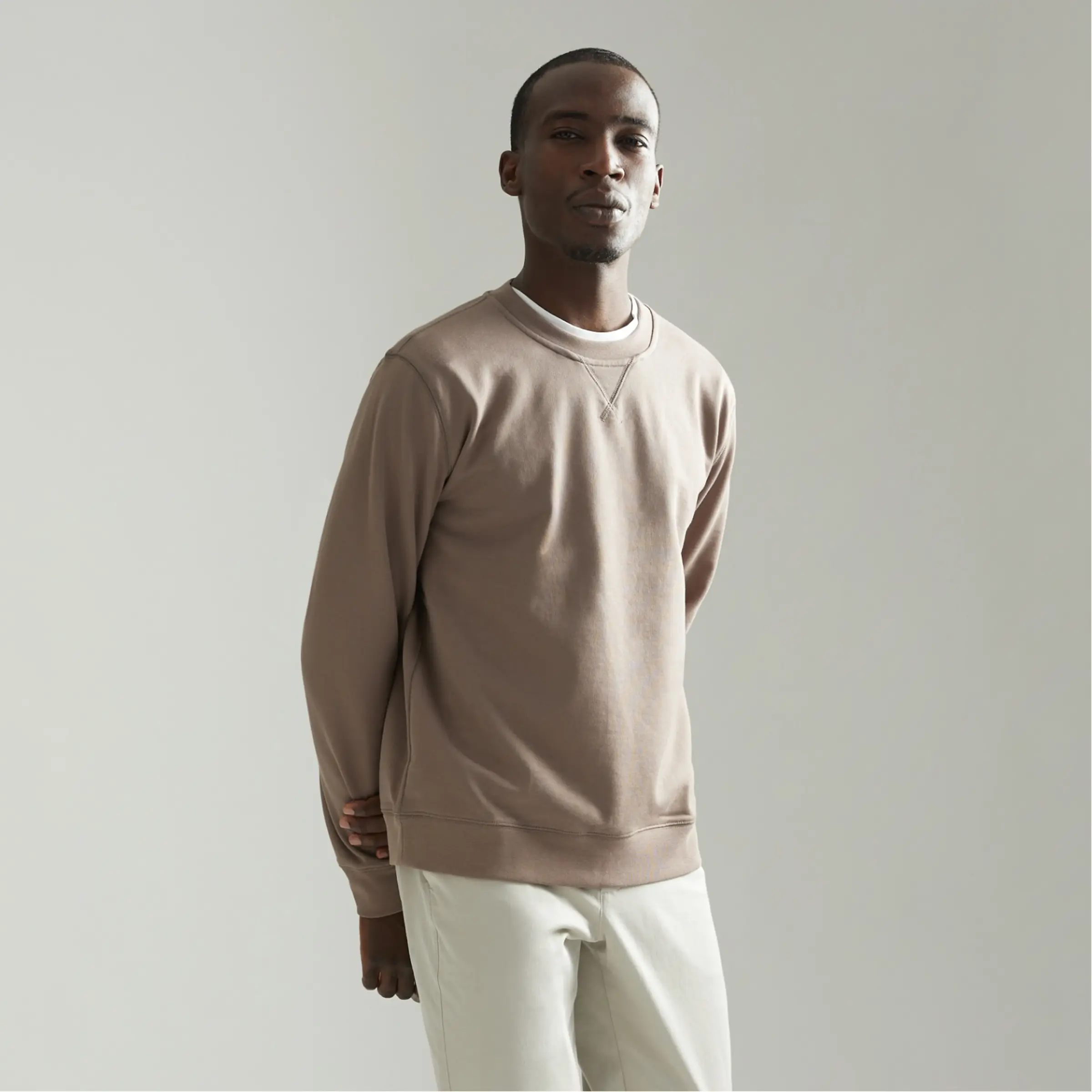 neutral crewneck sweatshirt with undershirt
