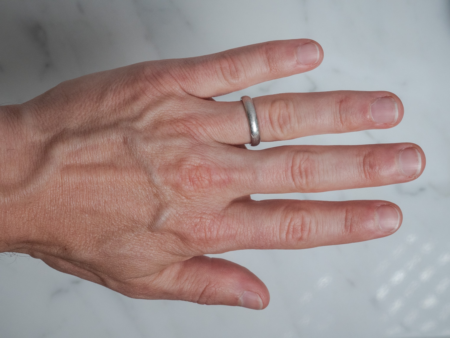 James Allen Platinum 4mm Wedding Ring on finger
