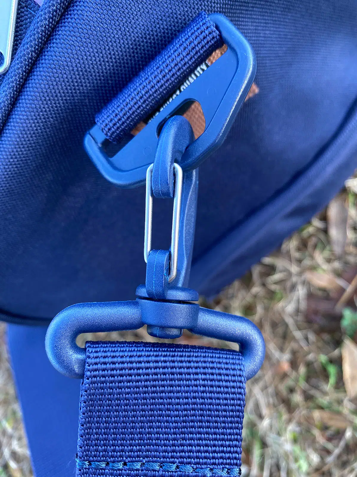 Herschel Novel Duffel Bag plastic strap holder