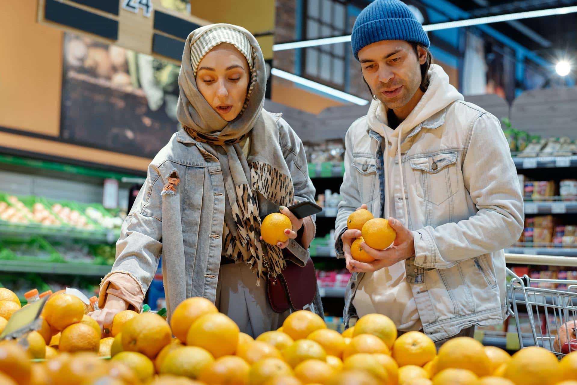 A couple shopping for fruits.