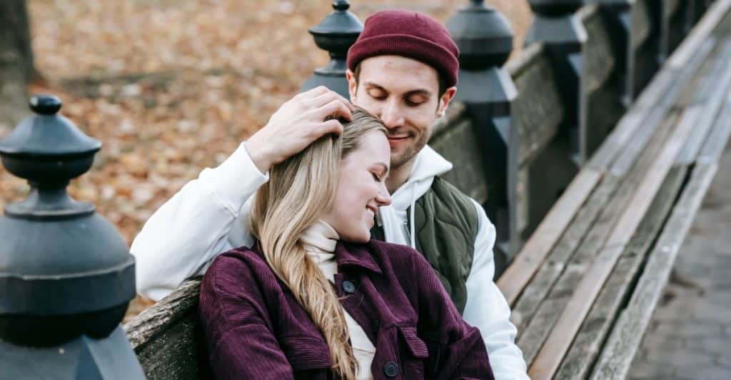 Young couple sitting in a park
