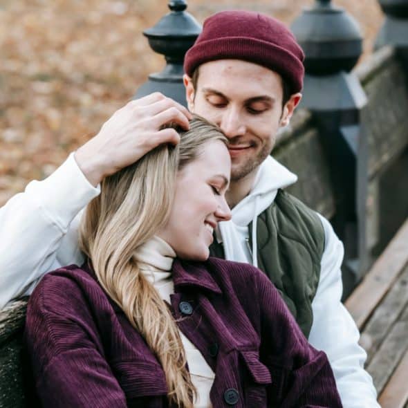 Young couple sitting in a park