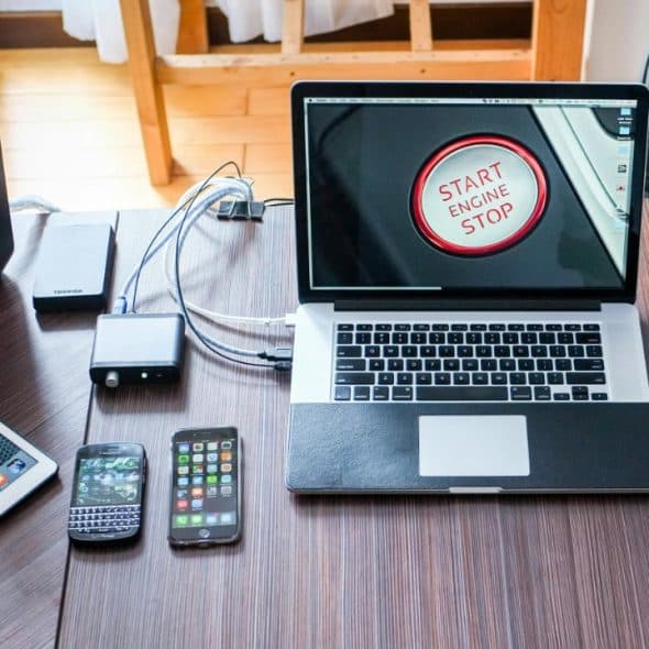 Laptop and Iphone on desk