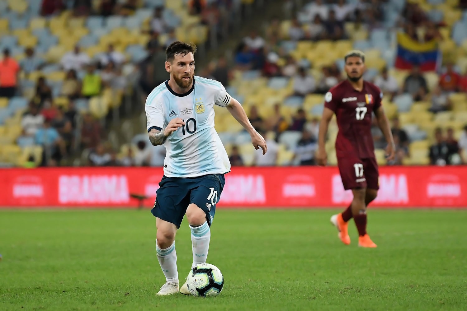 Lionel Messi dribbling the ball while playing for Argentina 
