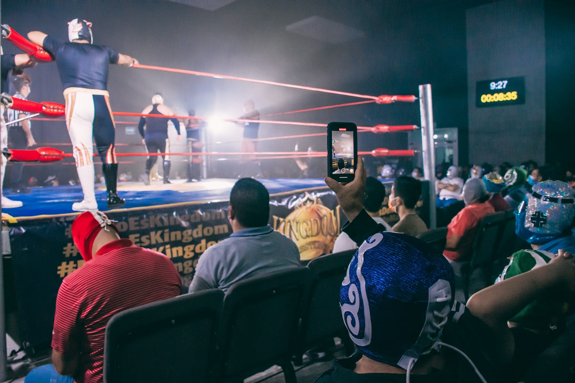 A view of a wrestling ring  from the spectator stand.