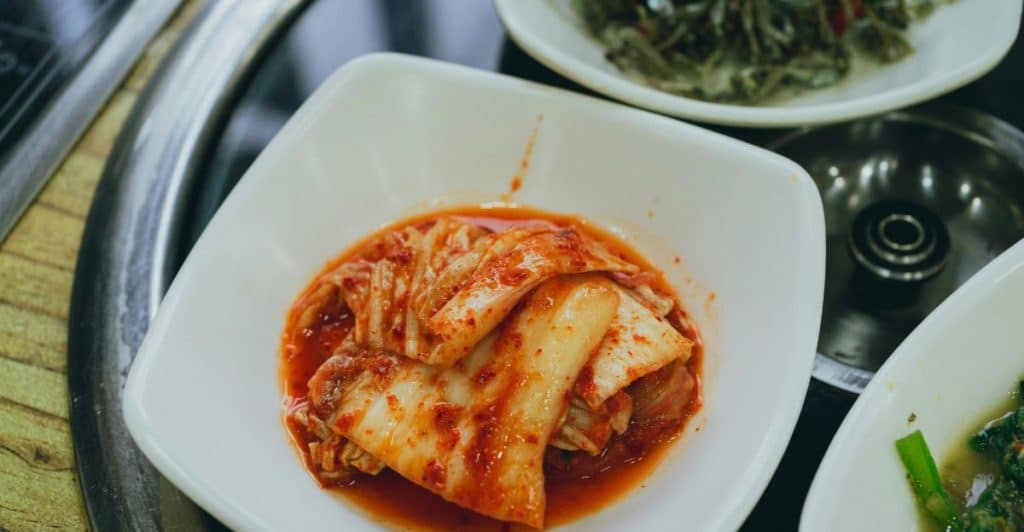 Close-up of kimchi in a white dish.