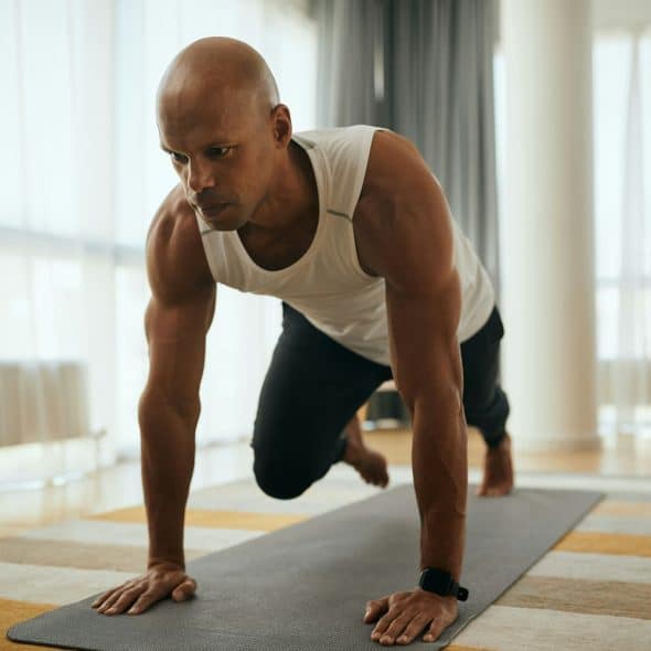 A man working out at home.