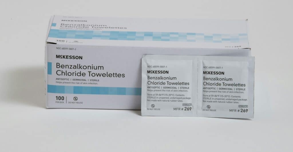 Box and individual packets of benzalkonium chloride wipes.