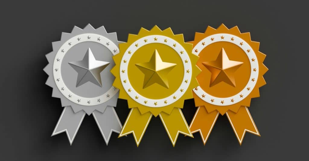 Gold, silver, and bronze award ribbons.