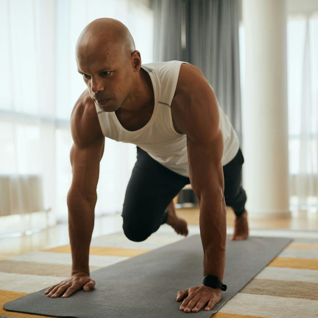 A man working out at home.