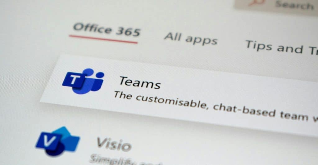A close-up of a computer screen showing the Microsoft Office 365 menu with "Teams" and "Visio" apps listed.
