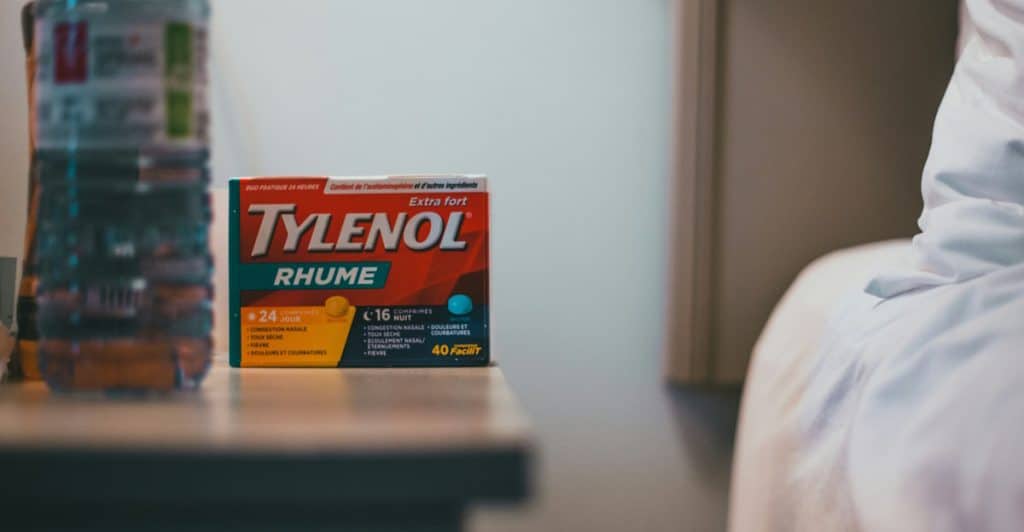 Box of Tylenol pain reliever on a table.