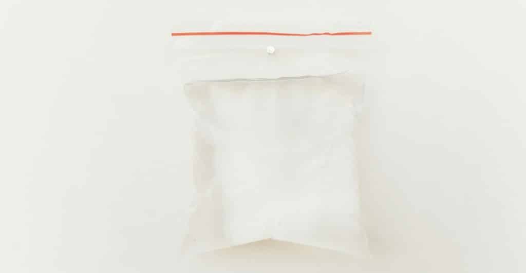Sealed plastic bag containing an instant cold pack.