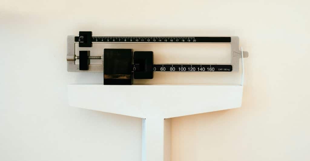A close-up view of a medical weight scale.