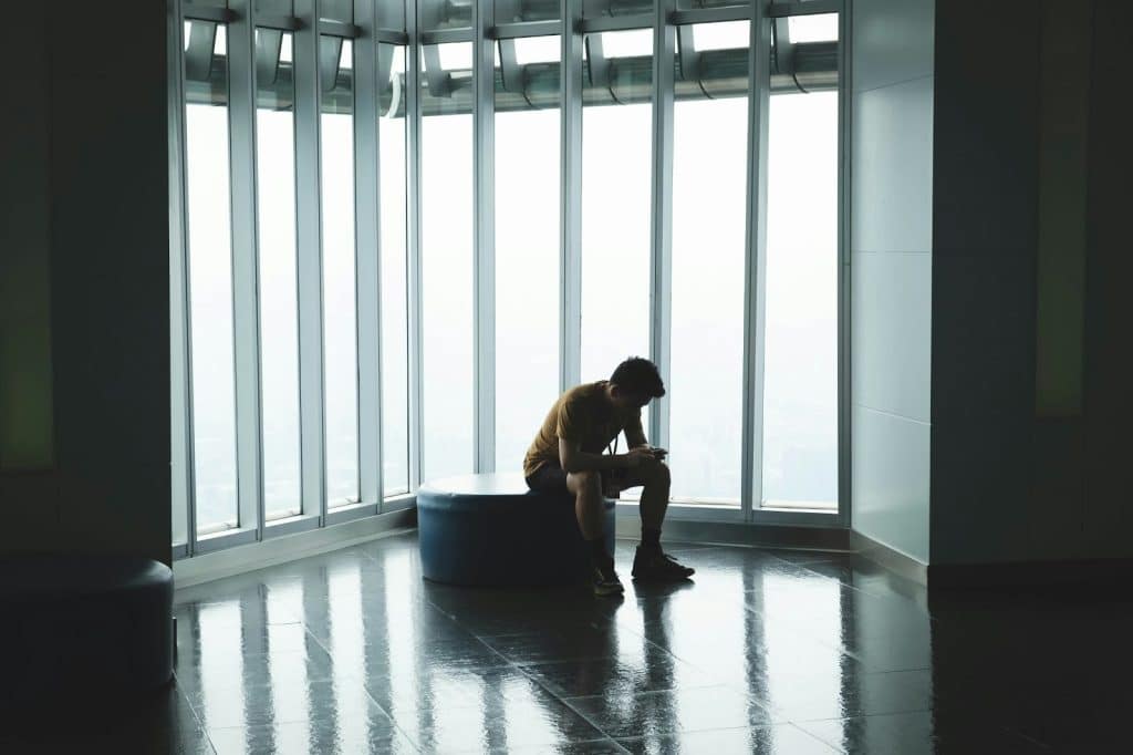 A man checking his weight