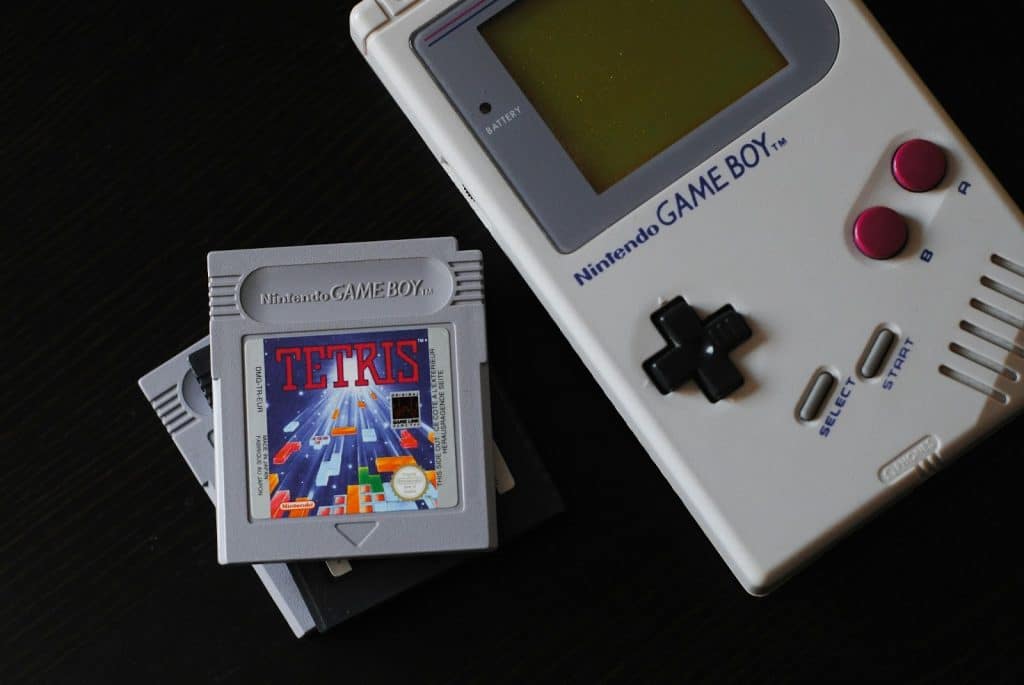 Old game boy with card game if tetris.