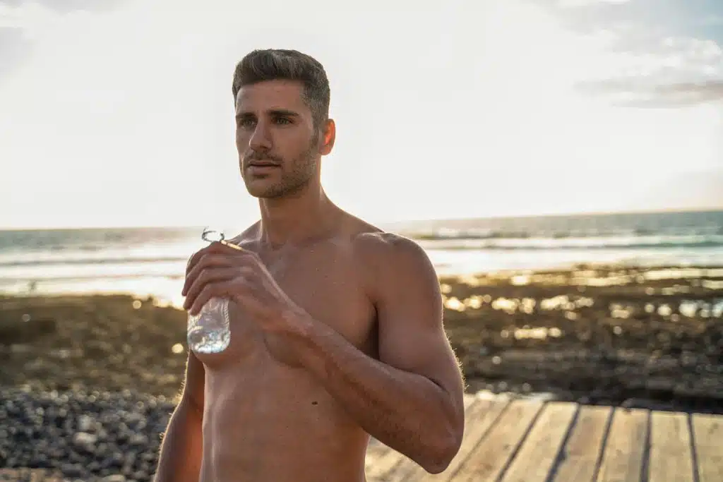 A man holding a water bottle