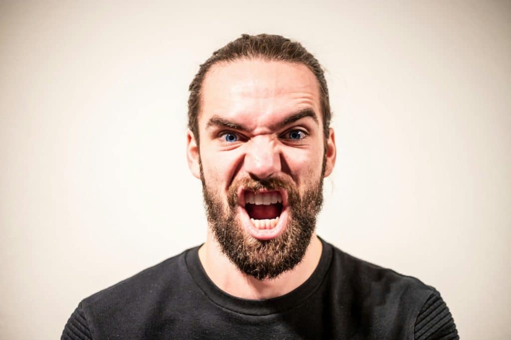 A man with an expression of anger