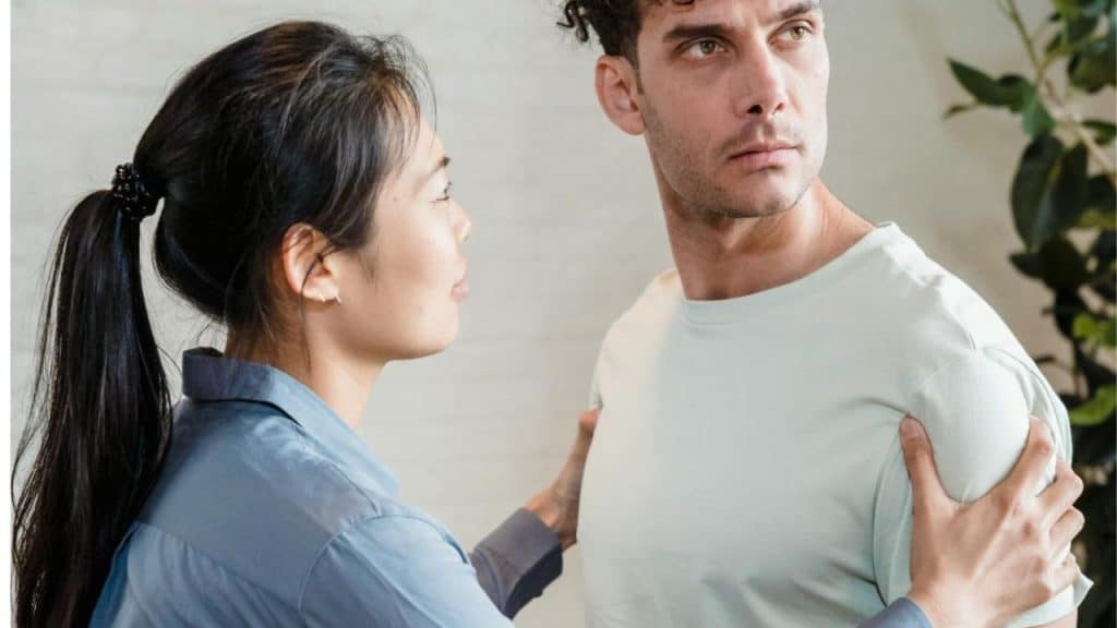 A man turns away during a tense moment, feeling ignored or overruled.