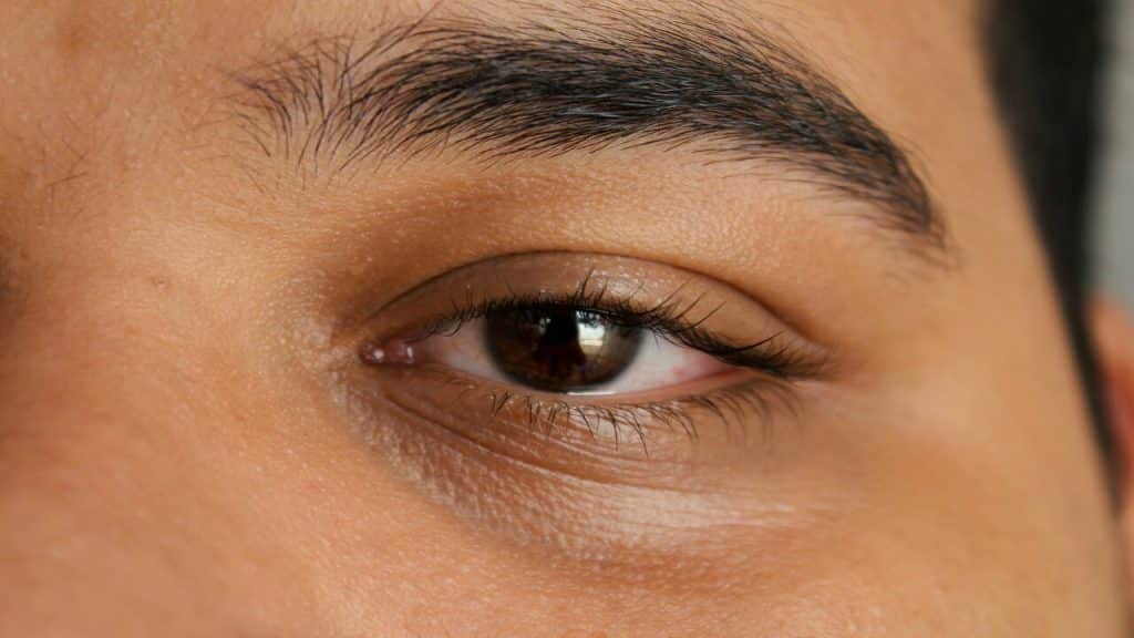 A close up of a man’s eyebrows.