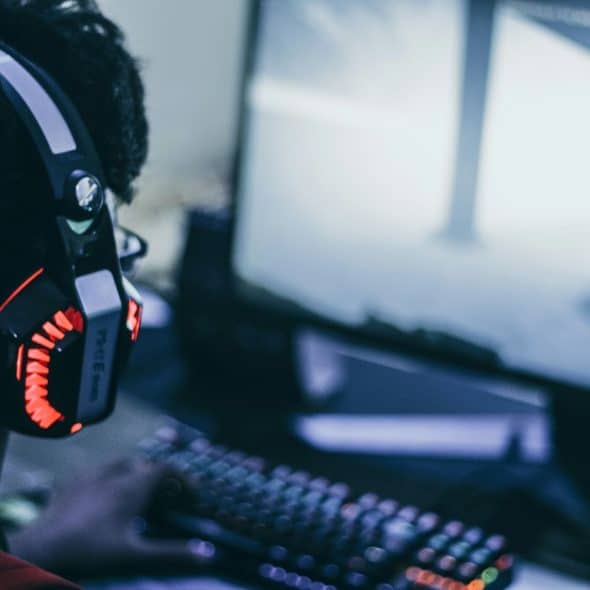 A man playing with his computer