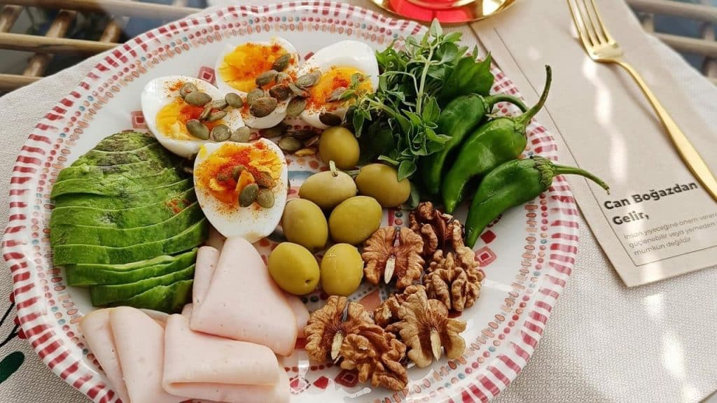 A plate with balanced portions of protein, vegetables, and whole grains.