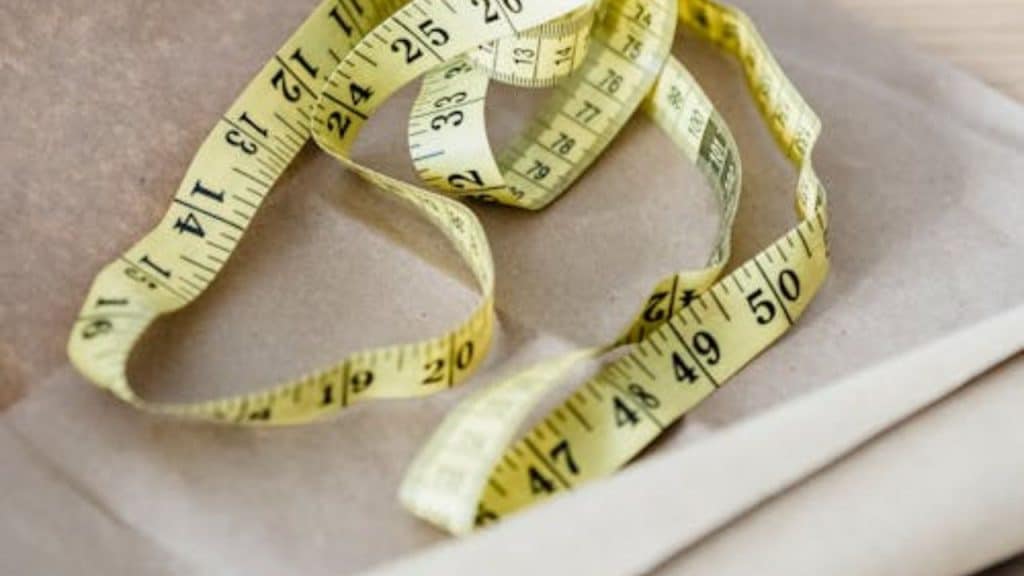 A tape measure used for tracking fat loss progress.