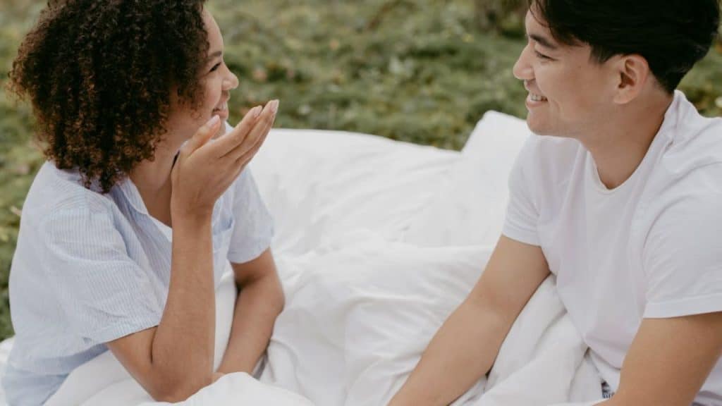 Man maintaining eye contact and calm body language in a conversation.