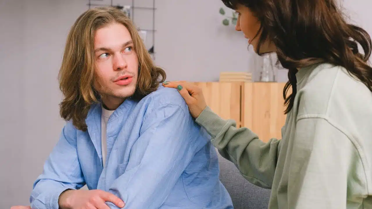 A young woman sharing her thoughts in a meaningful discussion with her older partner.