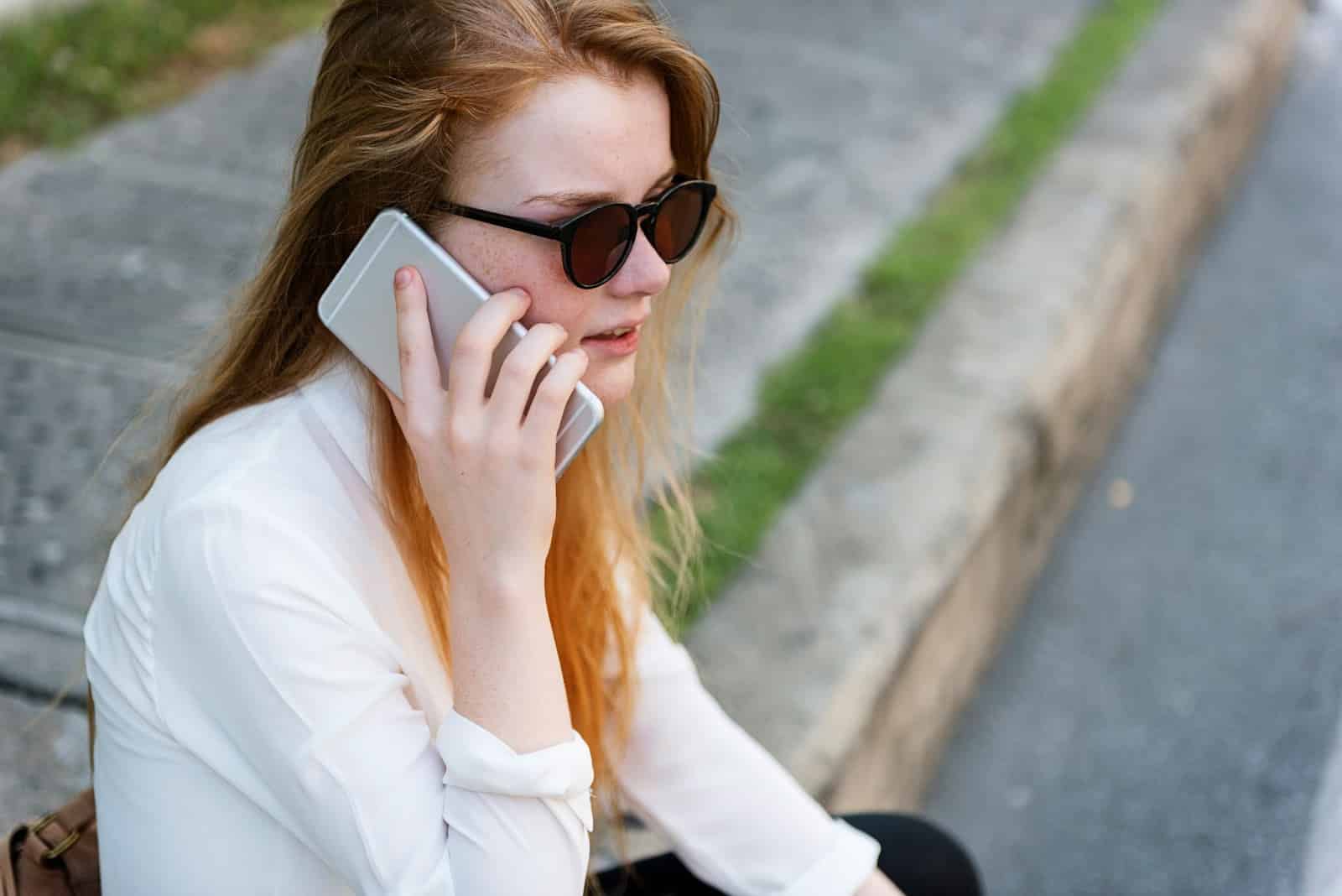 A woman calling someone on phone.