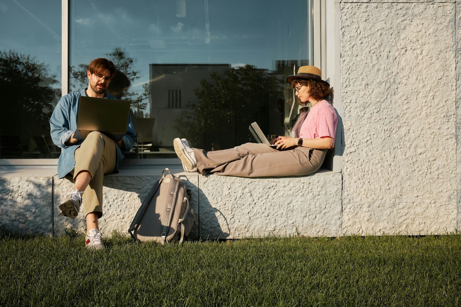 A picture of man and woman sitting across each other to represent boundary.