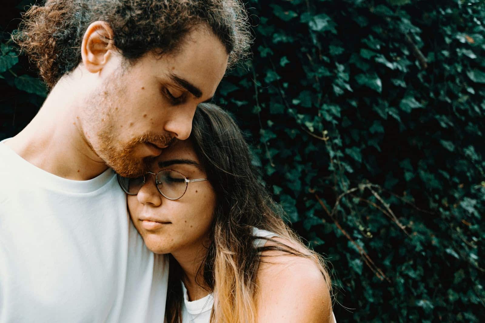 A man hugging a girl.