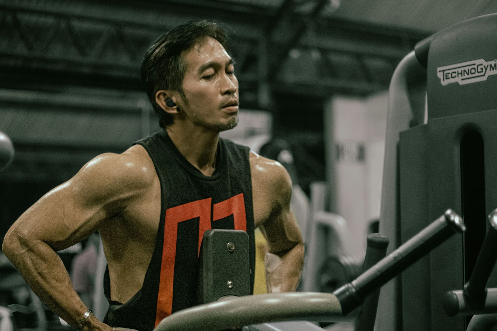 A man and woman holding hands with a rose.