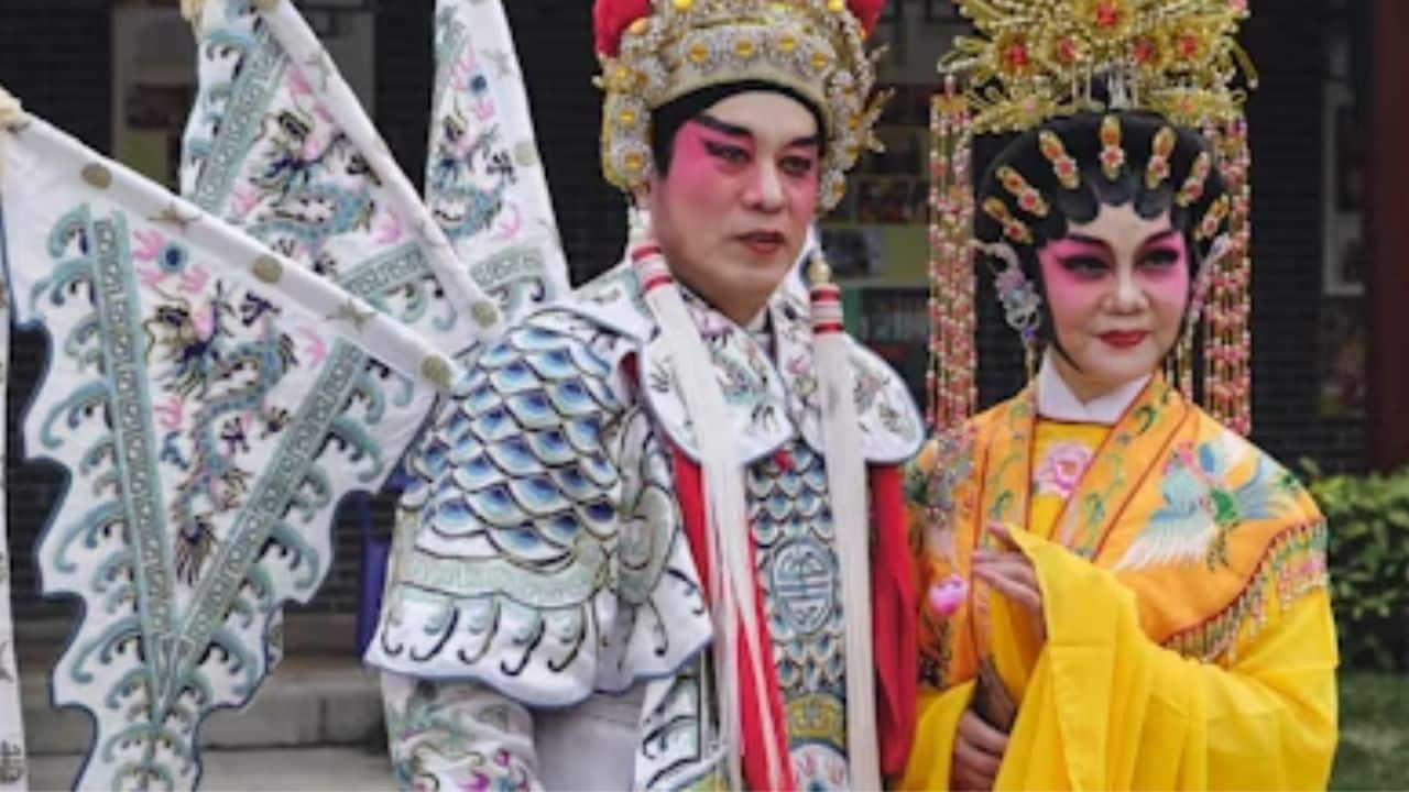 A couple celebrating a colorful cultural holiday together.