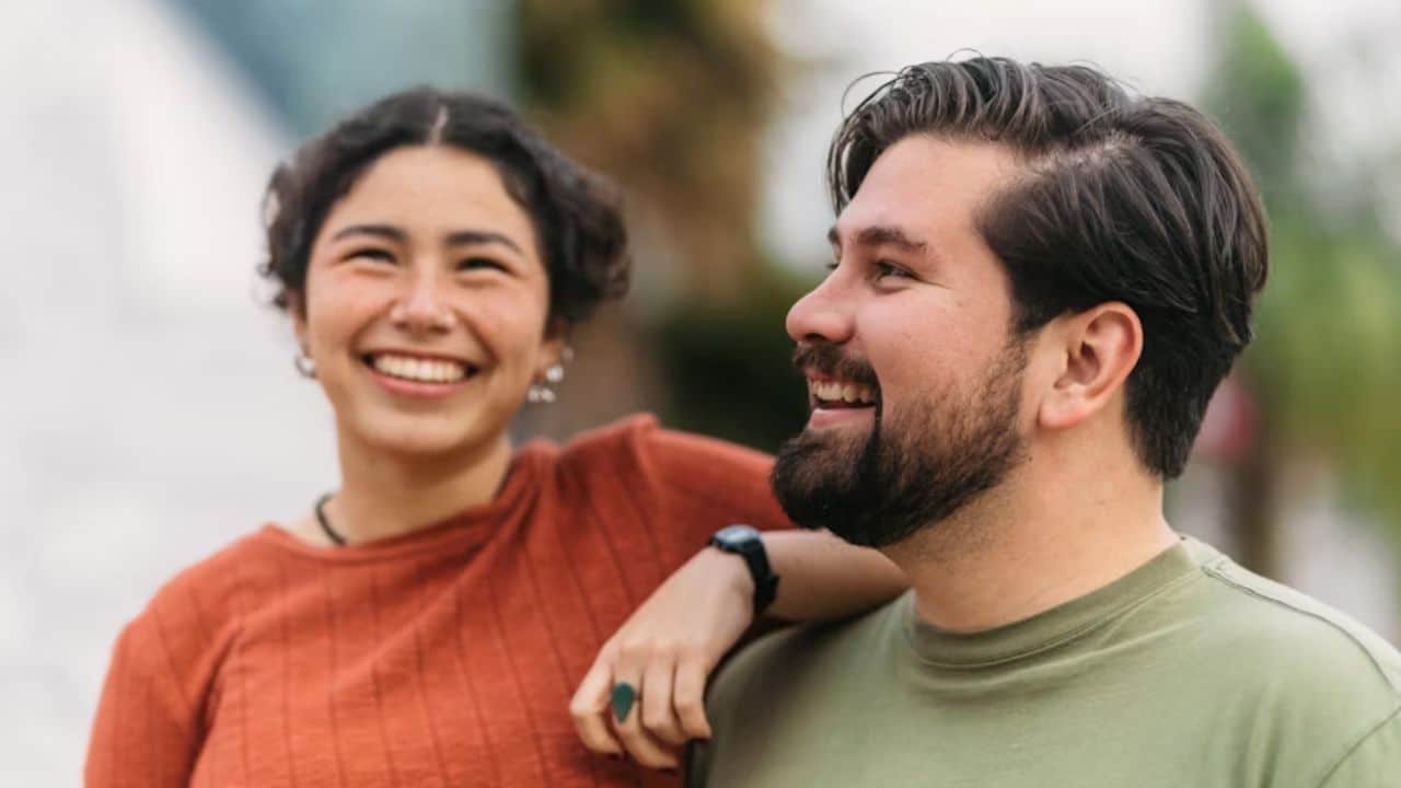 A couple looking genuinely happy without focusing on physical traits.