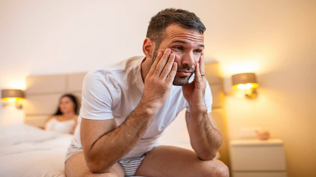 A man with a frustrated face after an argument with his partner.