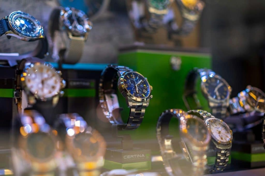 A picture of watches inside the glass