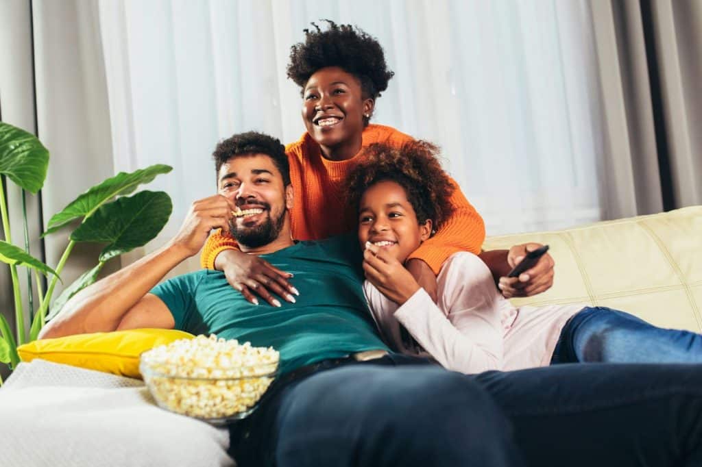 A happy family watching movie