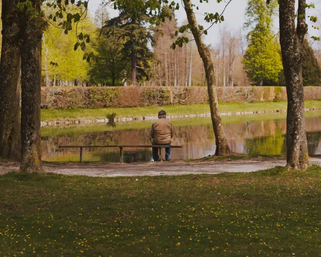 A man sitting alone at the park