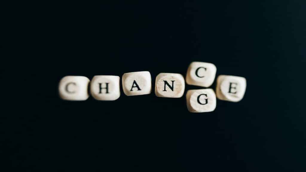 Dice spelling the words “chance” and “change”