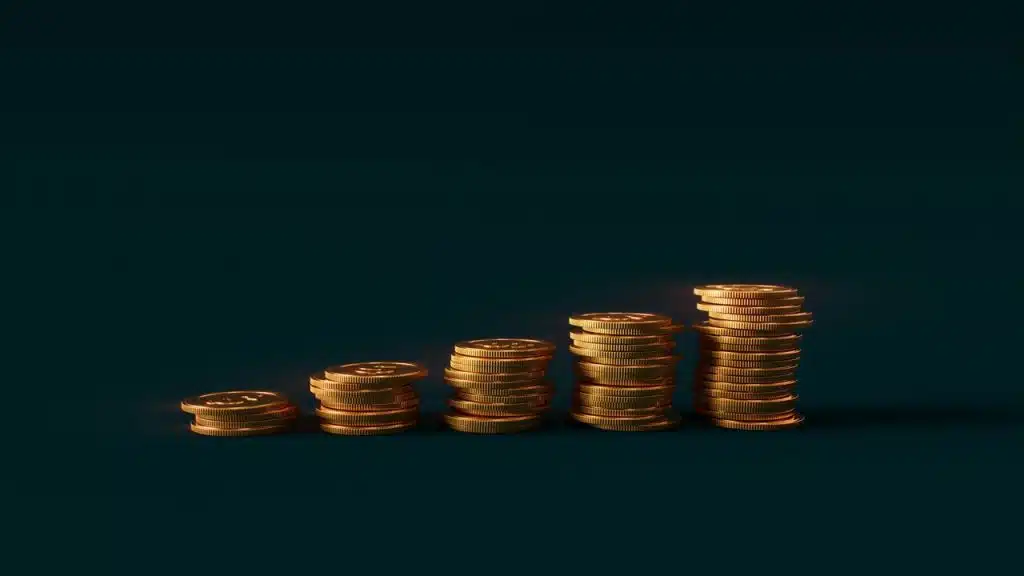 A stack of gold coins sitting on top of each other
