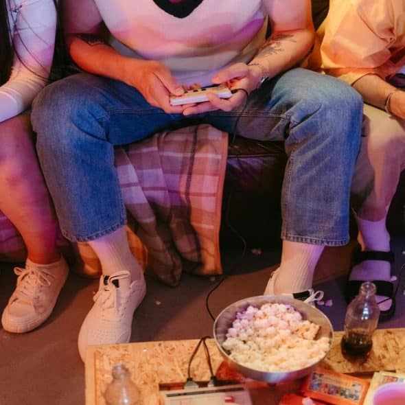 Friends gaming at home together.